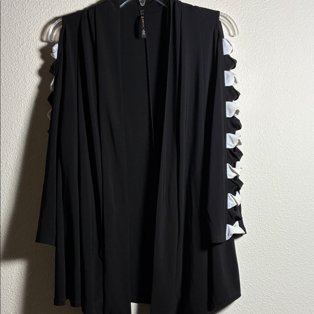 Black Cardigan with White Ruffle Accents